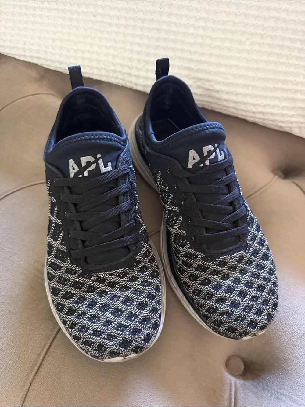 APL womens Knit Running Sneakers in Black and White